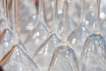 A group of Wine Glasses are dried after being washed before a party or tasting