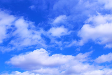 Fototapeta na wymiar Beautiful blue sky and white cumulus clouds. Background. Scenery.
