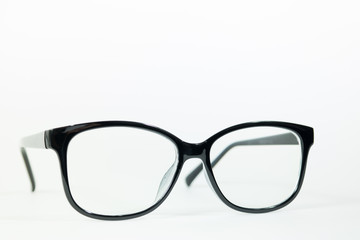 Black spectacles on a white background.