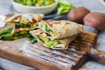 Spinach stuffed bread. Qutab flat bread filled with greens. Vegan healthy food