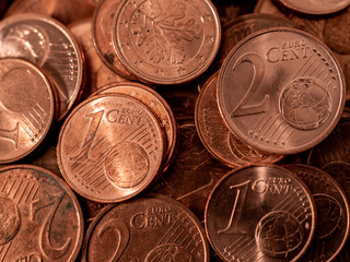 Image full of Euro cents, copper coin, one and two cents coin will be dismissed by ECB