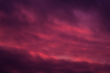 Background of sky pink red colours cloudscape, full frame nature landscape