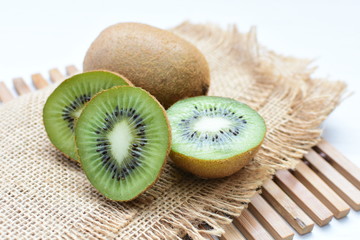  Fresh whole kiwi and half kiwi showing its texture