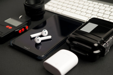 office work table, photography accessories, camera lens, with photometer, electronic phone book...