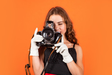 Professional camera. Education for reporters and journalists. Editing photos. Manual settings. Girl with retro camera. Capture moments. SLR camera. Learn use presets. Courses for photographers