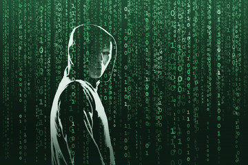 Computer hacker in mask and hoodie over abstract binary background. Obscured dark face. Data thief,...