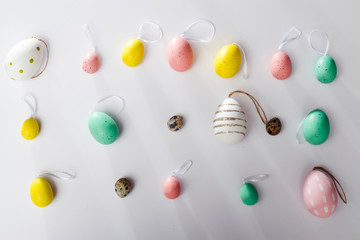 Multi-colored eggs on a white background. Easter card.