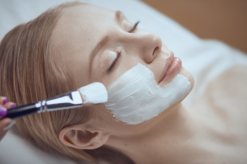 people, beauty, cosmetology and treatment concept - close up of