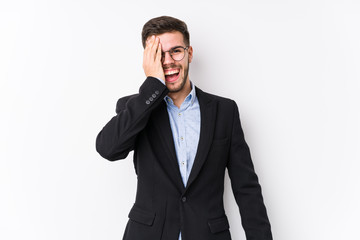 Young caucasian business man posing in a white background isolated Young caucasian business man having fun covering half of face with palm.