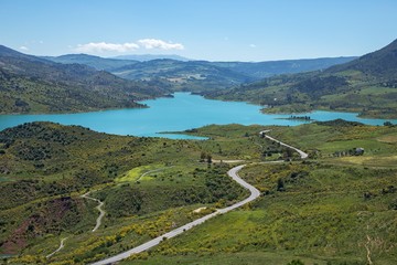 Water reservoir near Zahara de la sierra white village in Andalusia, Spain