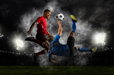 Fototapeta na wymiar Two soccer player man in action