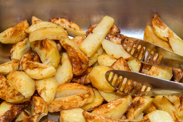 close-up of roasted potatoes in a tray