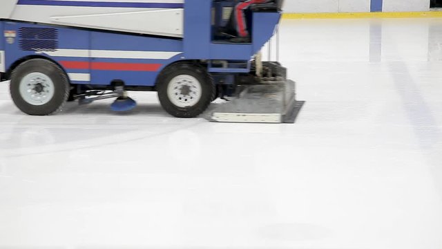 The machine cleans the ice. 