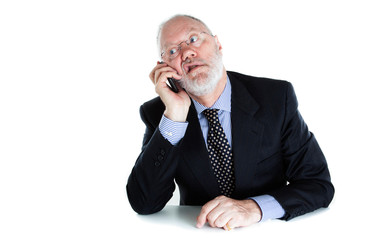 Senior elderly man as Lawyer Director Teacher or Salesman has really boring phone call on white...