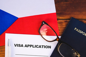 Flag of Czech Republic , visa application form and passport on table