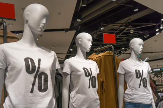 mannequins of girls with the inscription on white t-shirts discount sale percent