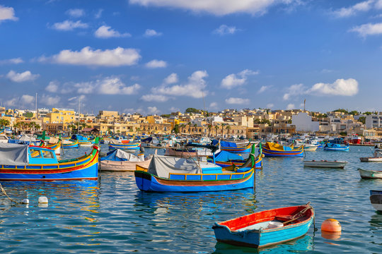 Malta, Marsaxlokk, Fishing town port with traditional Luzzu boats