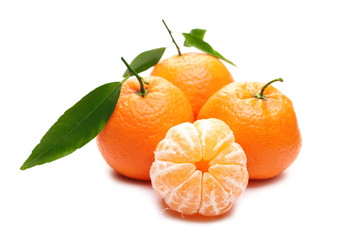 Tangerine with pieces isolated on white background