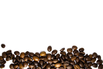 Coffee beans background, roasted coffee beans on a white background, space for text.