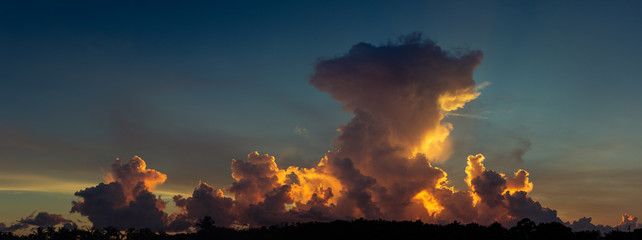 Growing clouds before storm at sunset sun light, florida