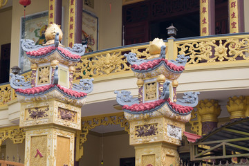 Nha Trang, Vietnam 1.19.2020. carved columns of a Buddhist temple in the city center