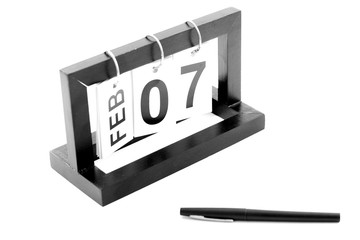 February 7th calendar icon. Day 7 of month. Office background.