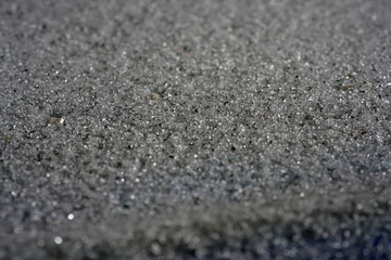 Sand photographed in the studio with color foils before the flash