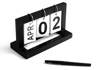 April 2th calendar icon. Day 2 of month. Office background.