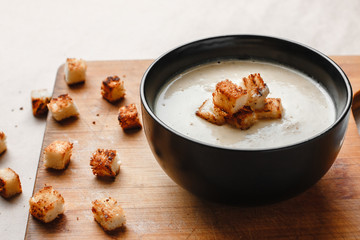 Mushroom cream soup with chicken and crackers