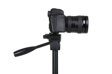 Camera on tripod isolated on white background