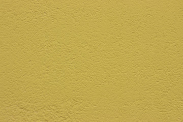 Yellow concrete wall background texture