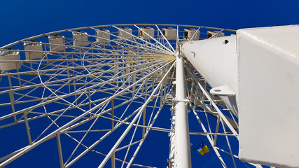 ferris wheel on blue sky