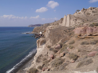 Fototapeta na wymiar Landscape with beach on the coast near Akrotiri. Santorini, Greece.