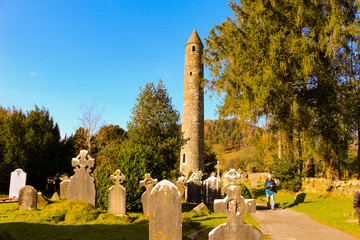photo of St. Kevin's monastic city at Glendalough famed for its rounds towers, and Celtic crosses