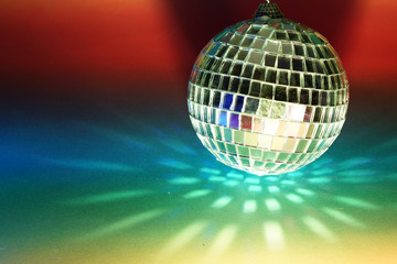 Disco ball with colored flash foils photographed in the studio