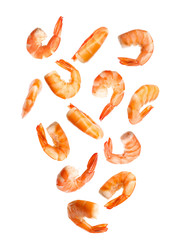 Falling delicious freshly cooked shrimps on white background