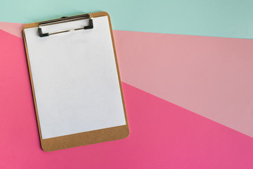 Mock-up clipboard with white paper sheet on colorful background. Business, notes and office concept