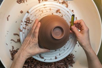 craftsman working on the potter's wheel © bsanchez