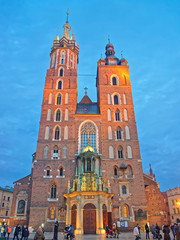 KRAKOW, POLAND - JANUARY, 9, 2014: Basilica of St Mary in the Main Market Square of the Old City in Krakow in Poland at Christmas
