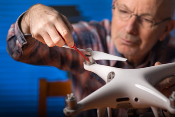 Man repairing drone