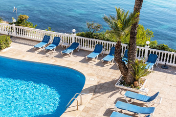 Empty Swimming pool. Mediterranean Sea. No people during coronavirus quarantine