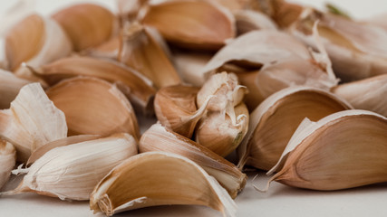 Fresh garlic cloves, top view. Food background, texture