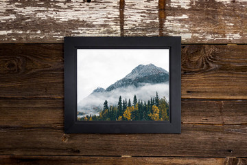 Photo frame on wood