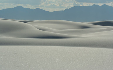 Wide view of undulating white dune field at White Sands National Park