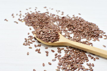  natural flaxseed seeds displayed in containers