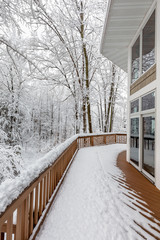 Deck on Home in Snowy Woods in Winter © james_pintar