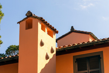 Detail of Spanish tiles on a roof in the historic district, Jekyll Island, a popular slow travel tourist destination.