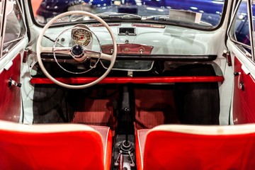 vintage steering wheel in antique car