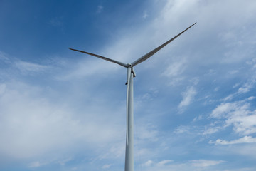 Rope access technicians working on a wind turbine blade