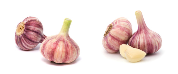 Garlic with leaves of parsley isolated on white